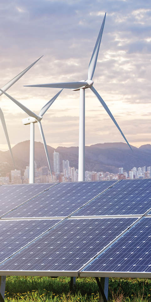 Solar panels and wind turbines with city